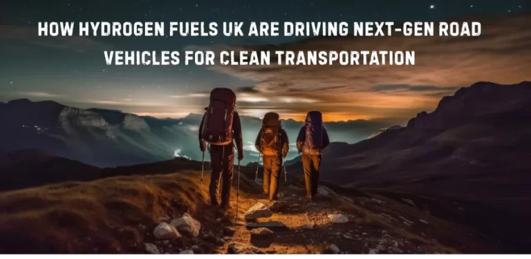 Three people standing on a mountain overlook at sunset, viewing a scenic mountain landscape with dramatic orange and purple skies. White text overlay reads 'GEN FUELS UK ARE DRIVING NEXT VEHICLES FOR CLEAN TRANSPORTATION' against the twilight sky